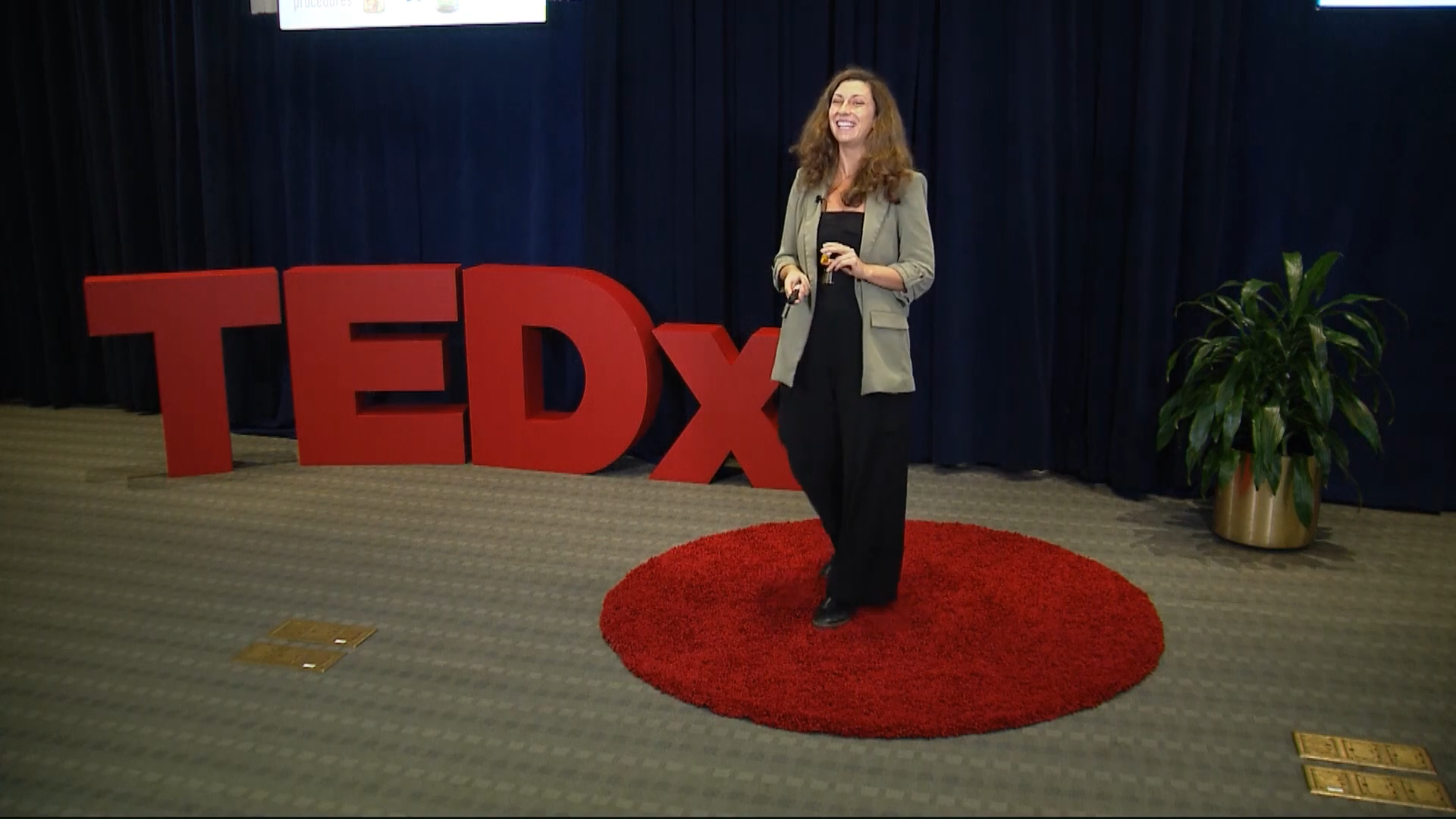 Julia Hotz speaking at TEDxRiverOaks